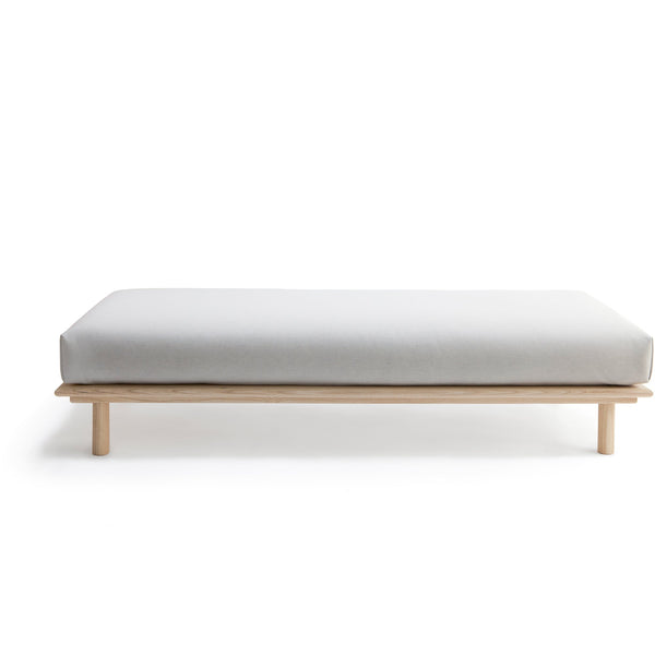 Nikari's Linea Daybed Bench with a cushion included. Perfect for a museum gallery or your home