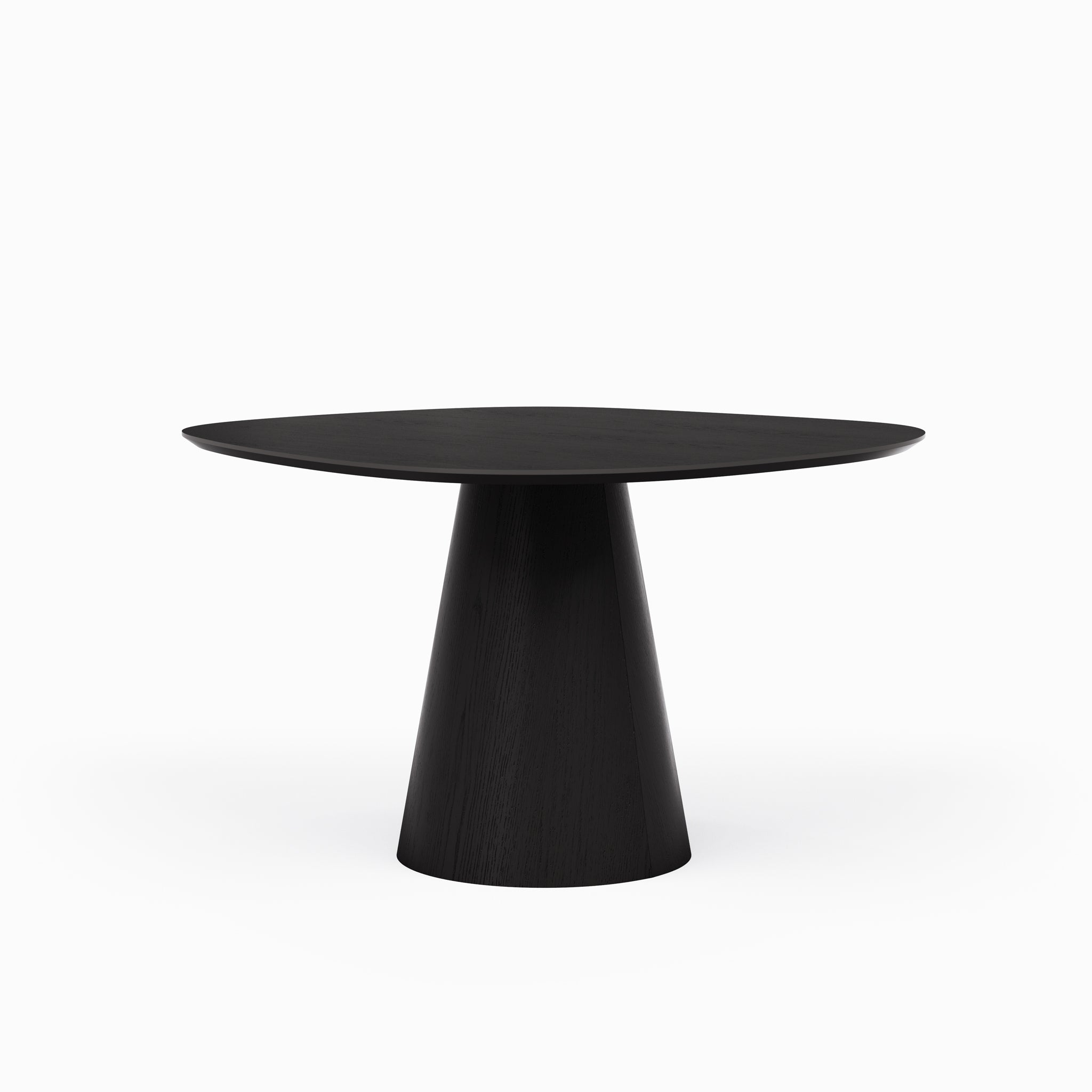Close-up of a conical wooden table leg and edge