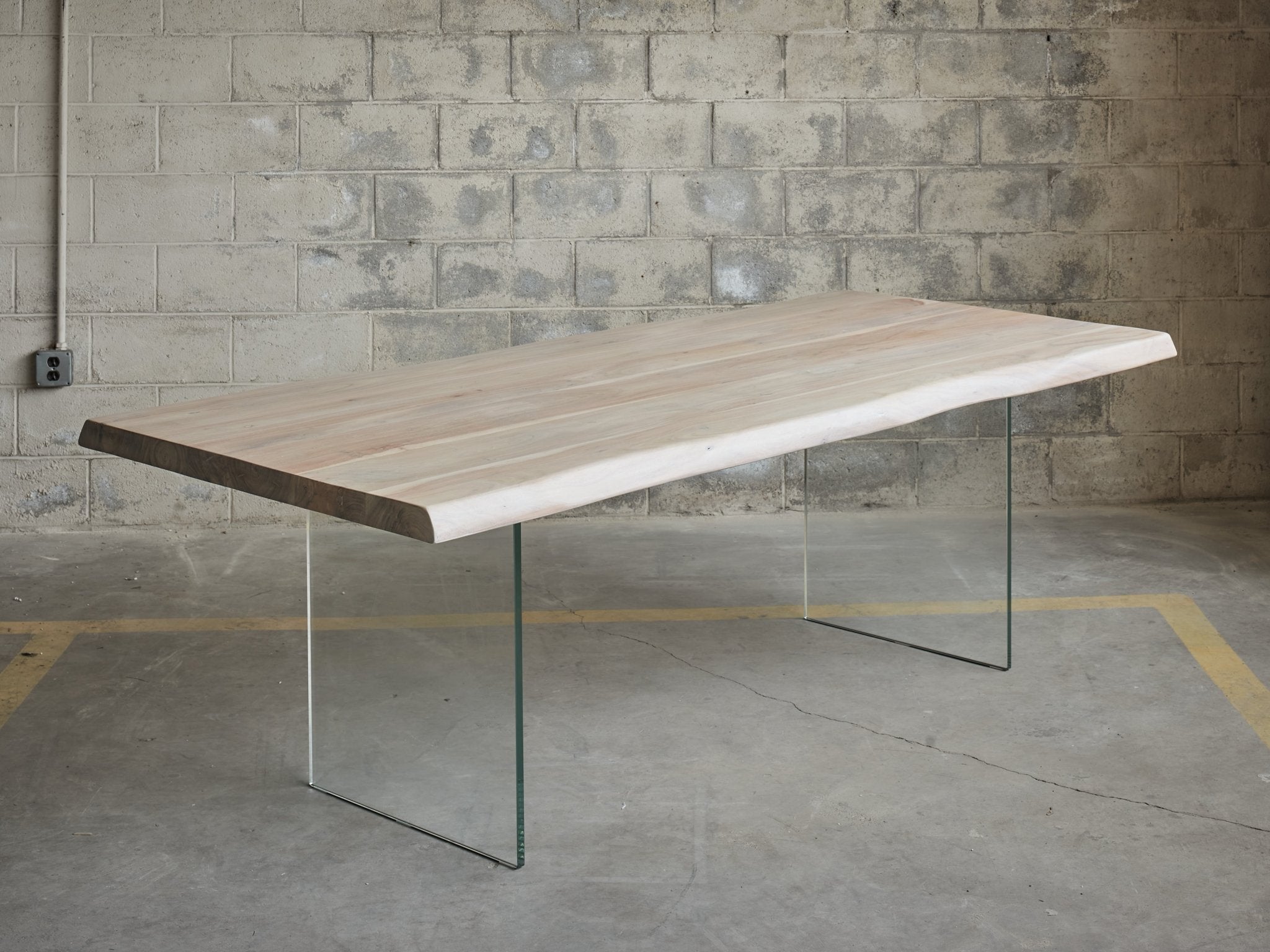 A simple wooden bench with a light wood top.