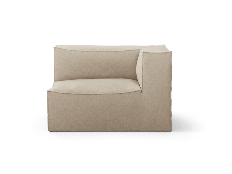 A light beige modular sofa with exposed side and low arms.