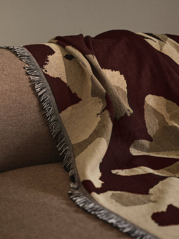Cilla Tapestry Blanket styled in a contemporary interior - Ferm Living