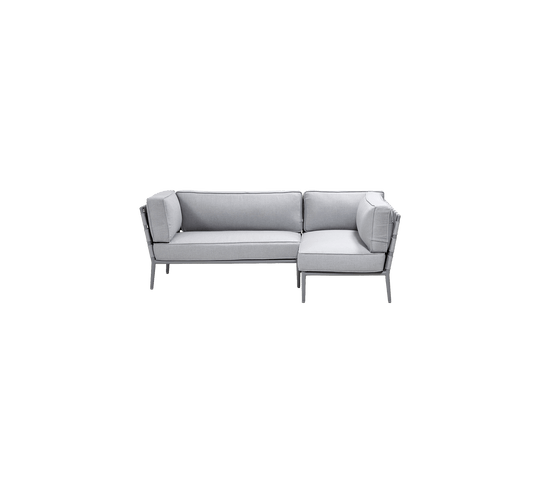 Stylish light grey sectional sofa with a modern design, featuring plush cushions for comfort and sleek metal accents.