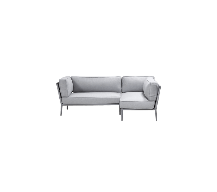 Stylish light grey sectional sofa with a modern design, featuring plush cushions for comfort and sleek metal accents.