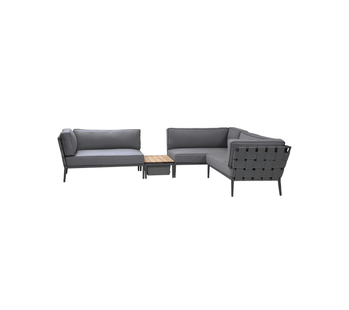Modern gray seating arrangement with plush cushions and a wooden accent table, ideal for stylish relaxation and social gatherings.
