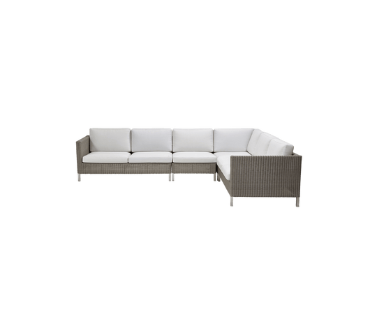 Stylish sectional sofa with a weave design and plush white cushions, perfect for cozy seating.