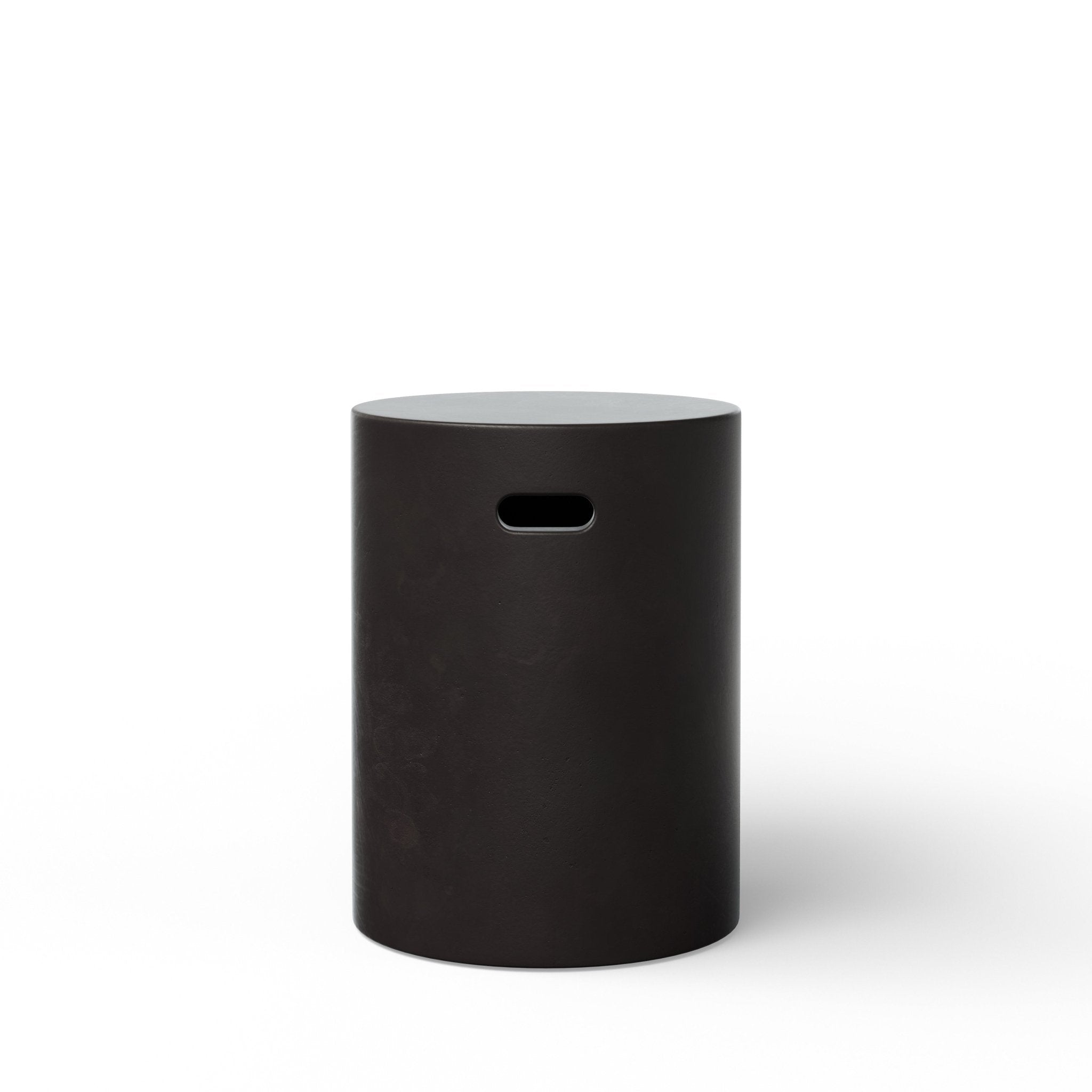 Close-up of a speckled terrazzo surface pattern on a cylindrical stool, showing texture and material.