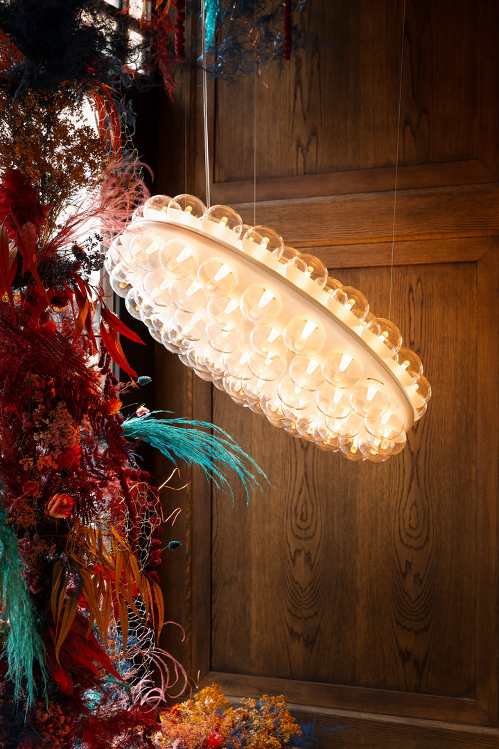Prop Light Suspended in a styled interior - Moooi