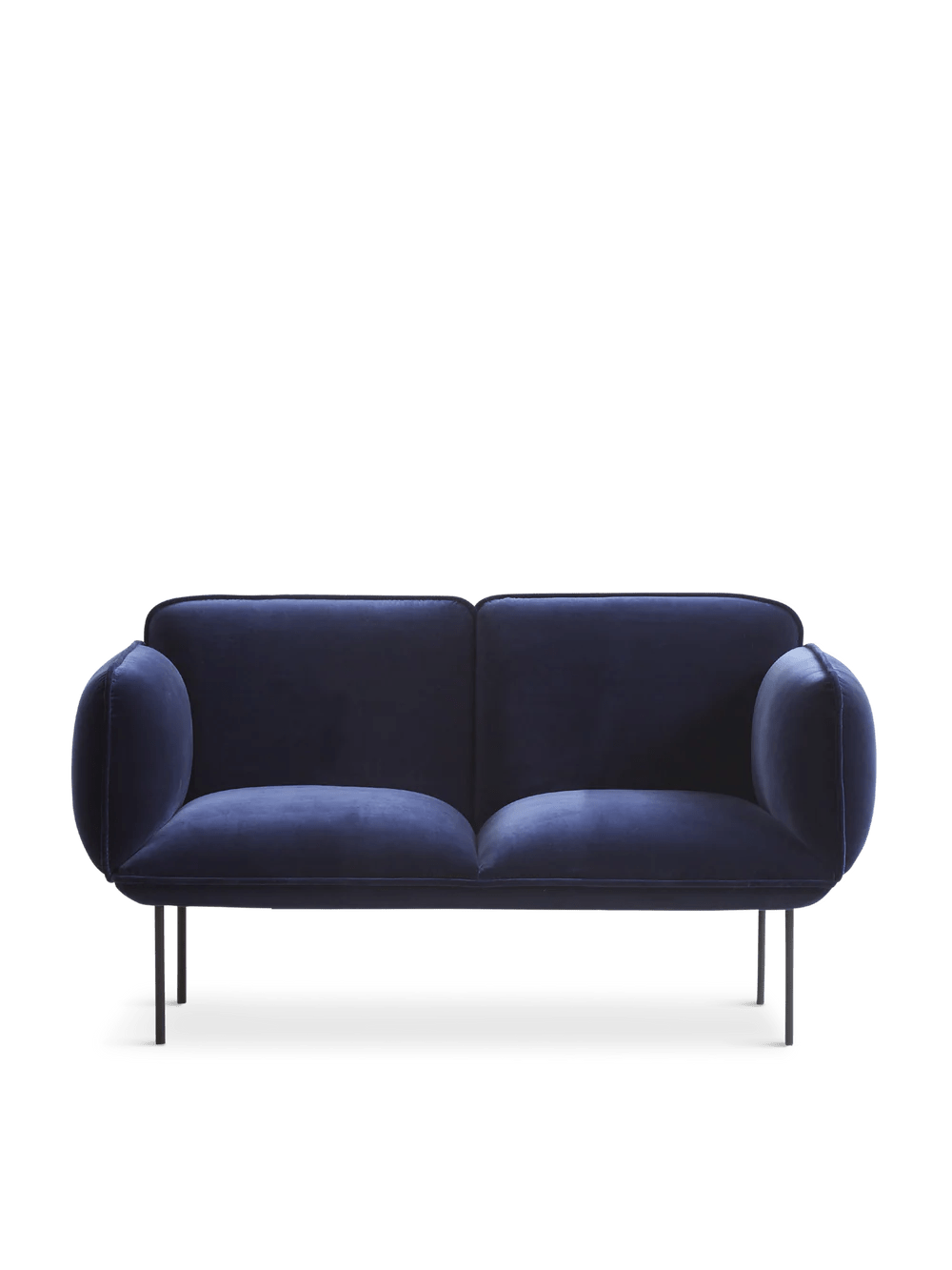 A blue couch with metal legs