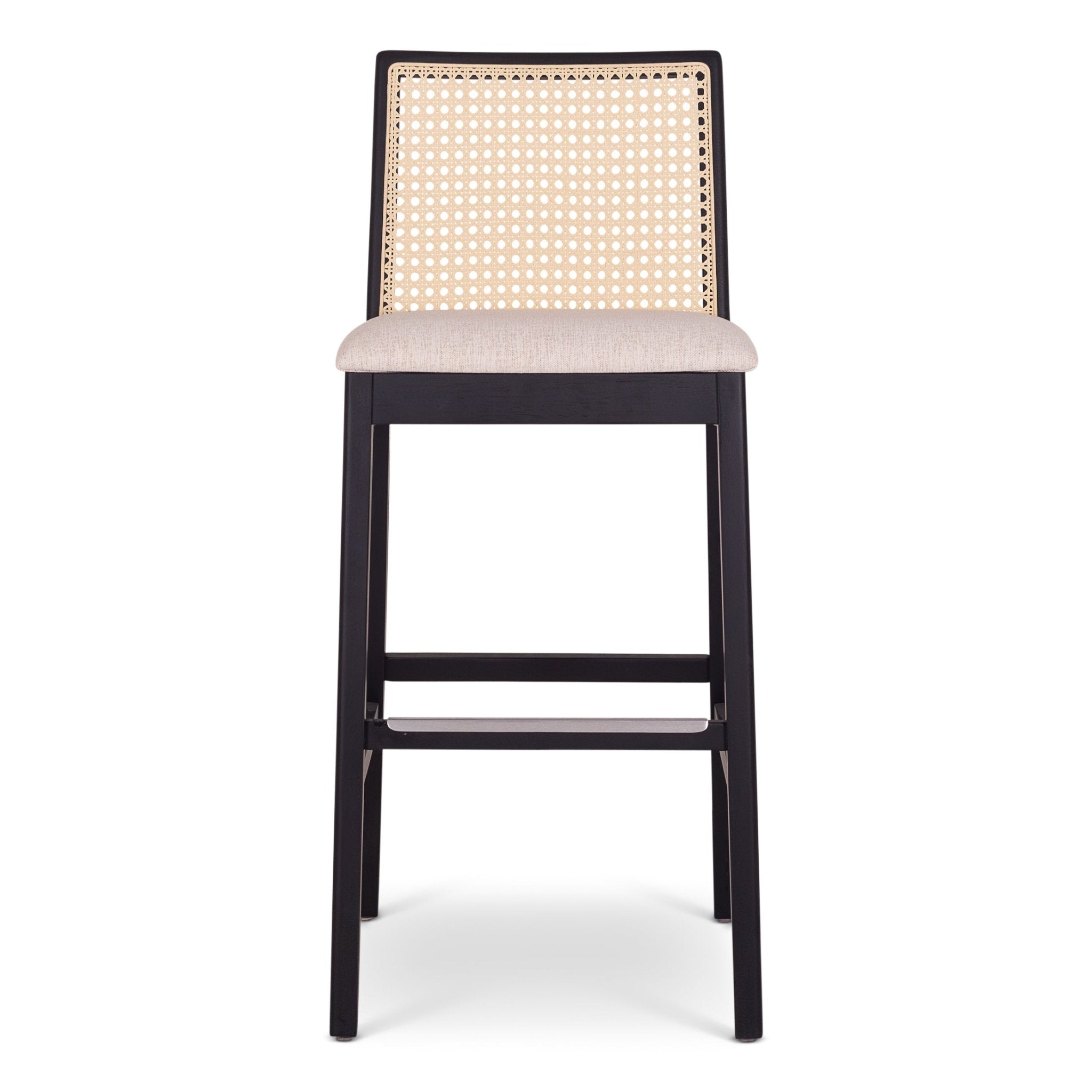 Dark brown wood bar stool with caned back and metal footrest.
