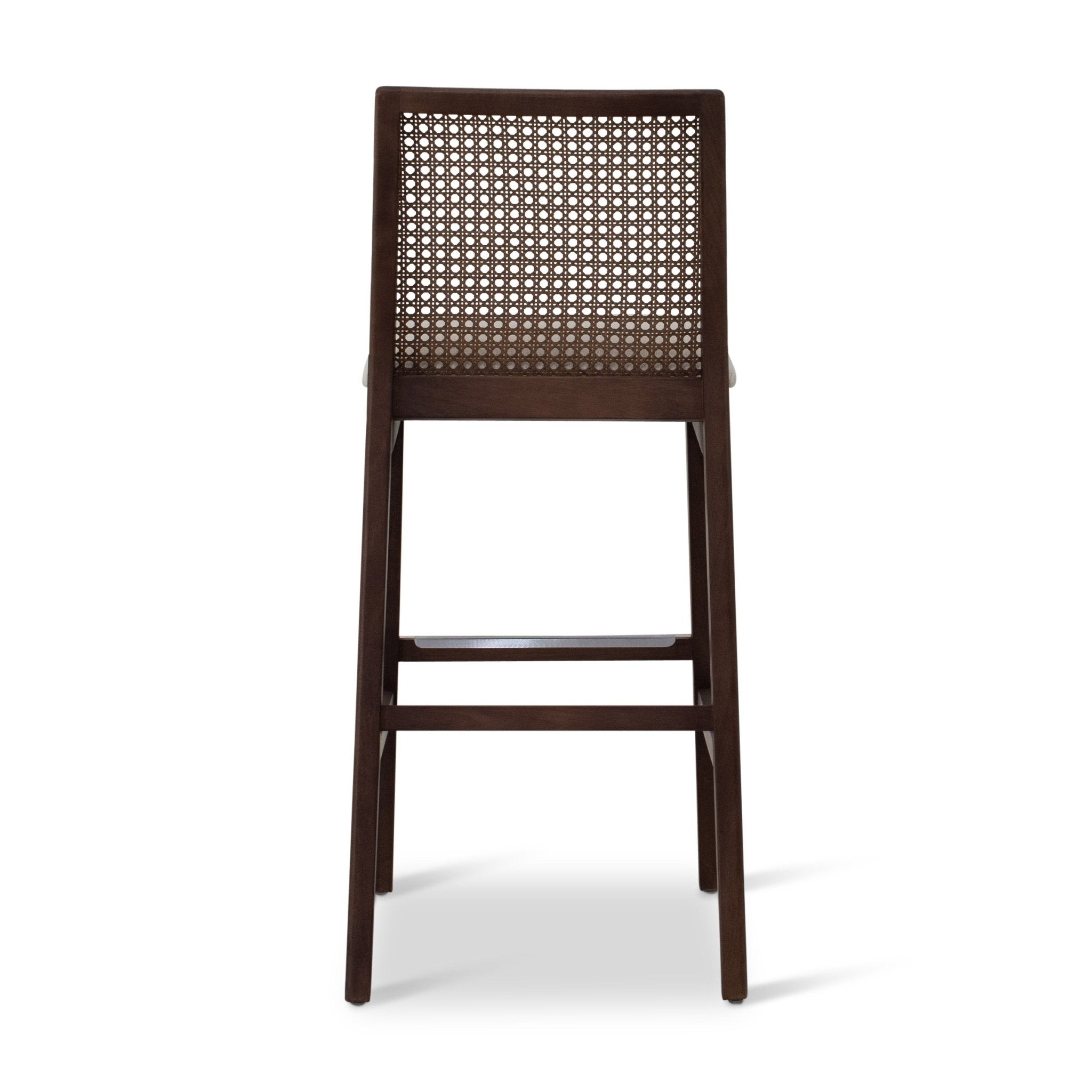 Dark wood bar stool with caned back, back view.
