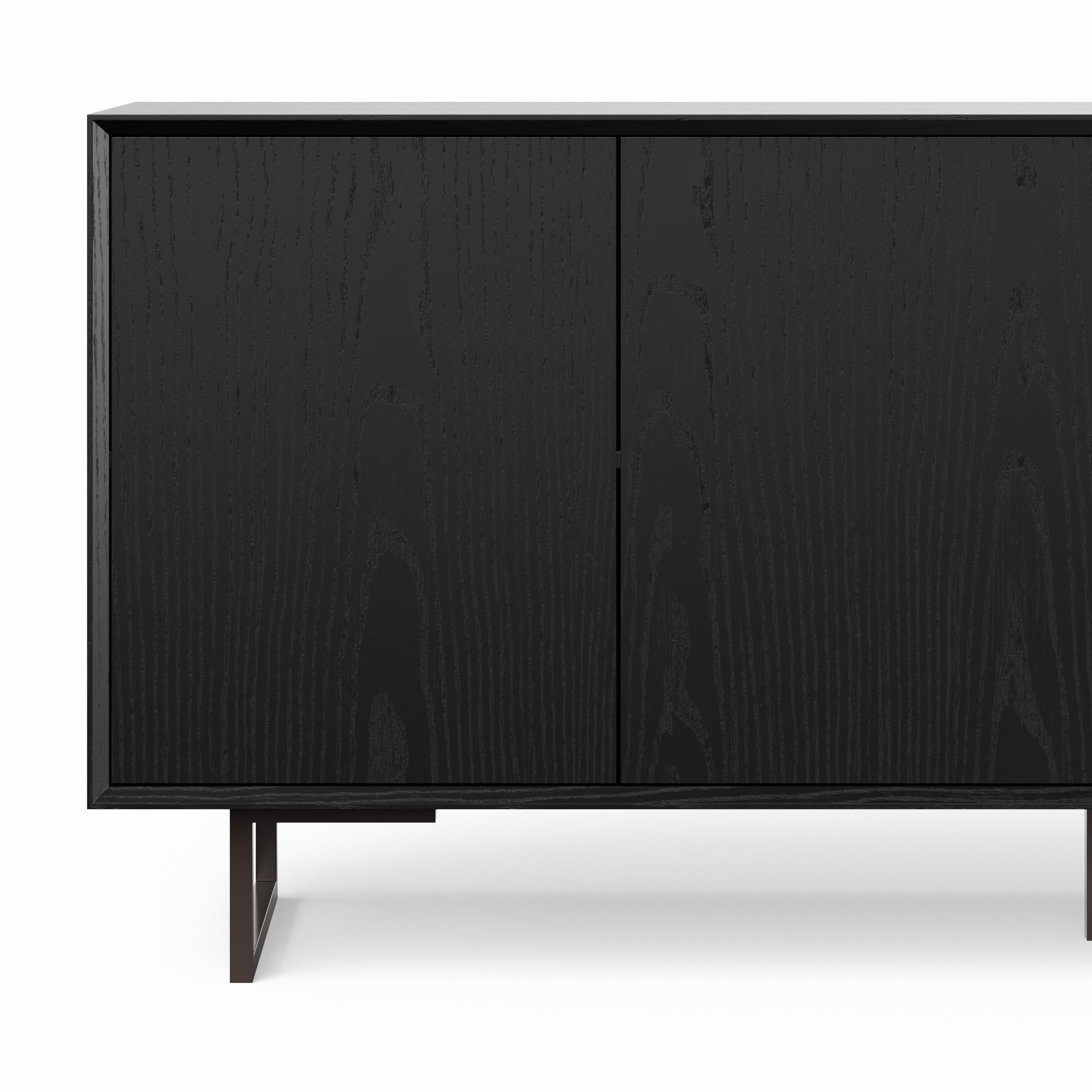 Interior of a light wood cabinet with shelves and a drawer, showing storage compartments.