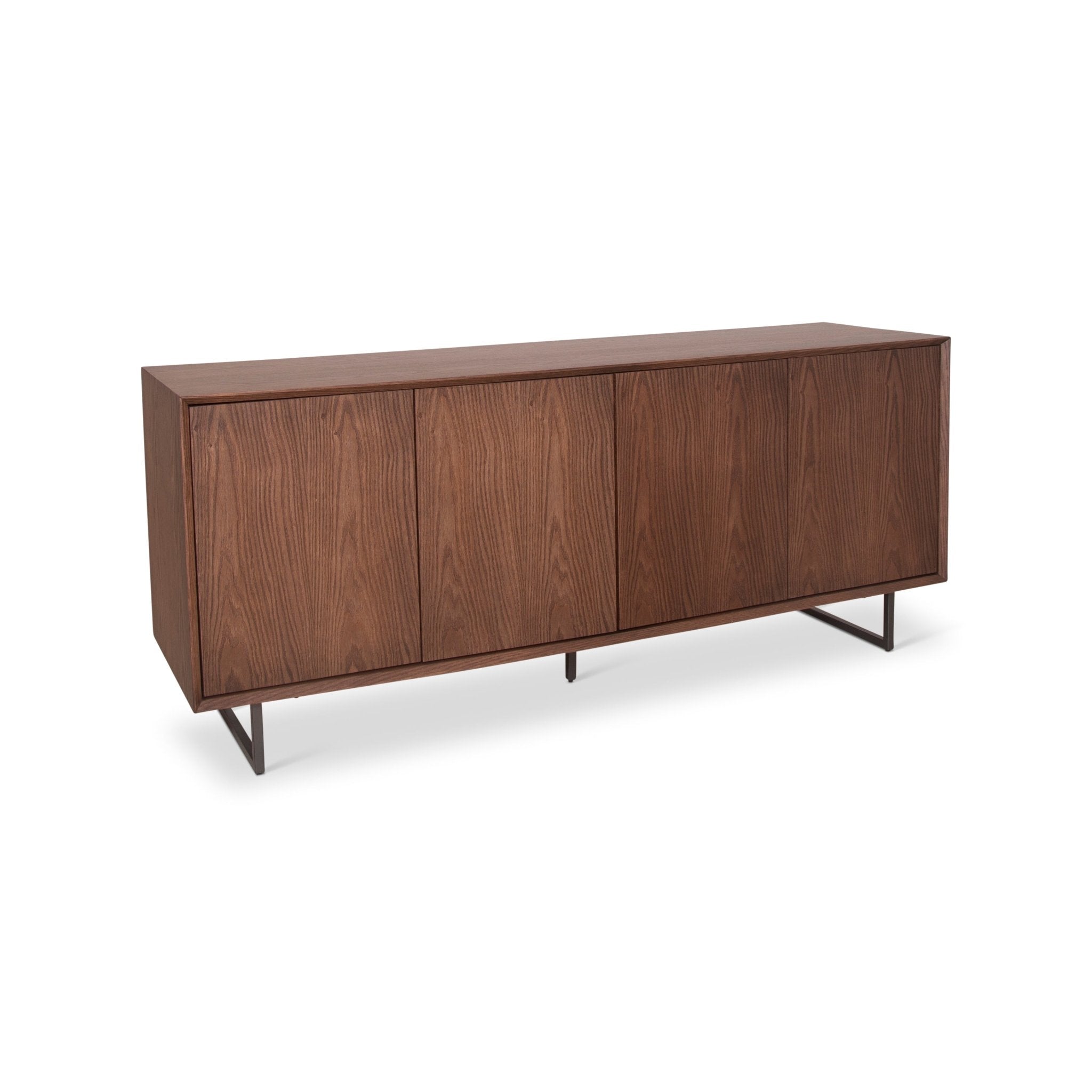 Black sideboard with four doors and metal legs viewed from side with white background.