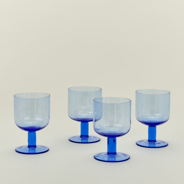 Set of four simple seeded stemware in blue.