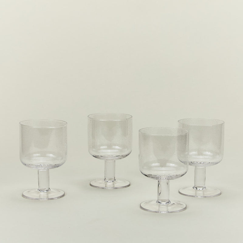 Set of four simple seeded stemware in blue.