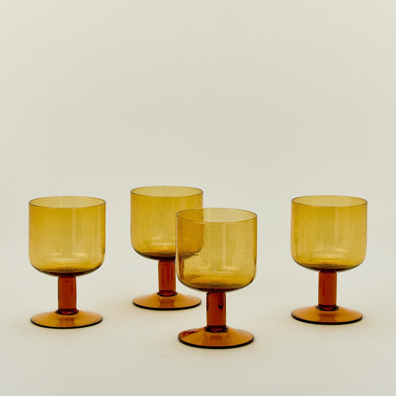 Set of four simple seeded stemware in blue.