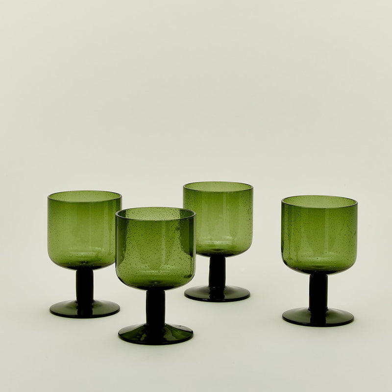 Set of four simple seeded stemware in blue.
