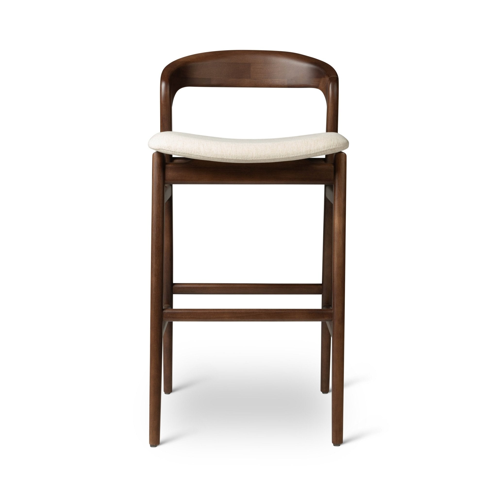 Side view of a dark wood bar stool with beige padded seat, showing its legs and footrest.