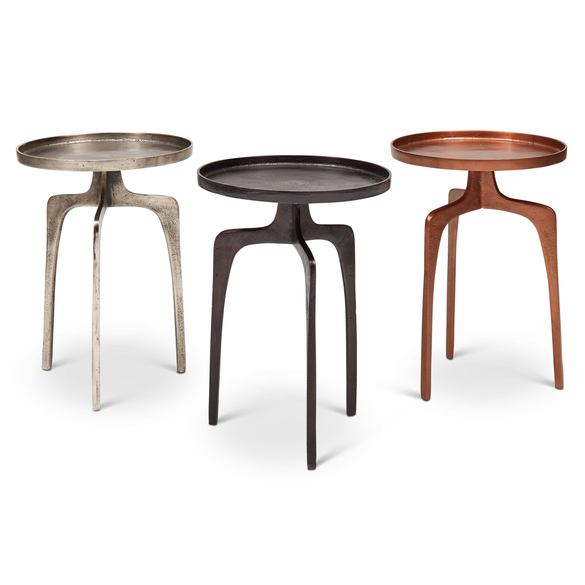Metal stool with round top and three legs, close-up of legs and joint.