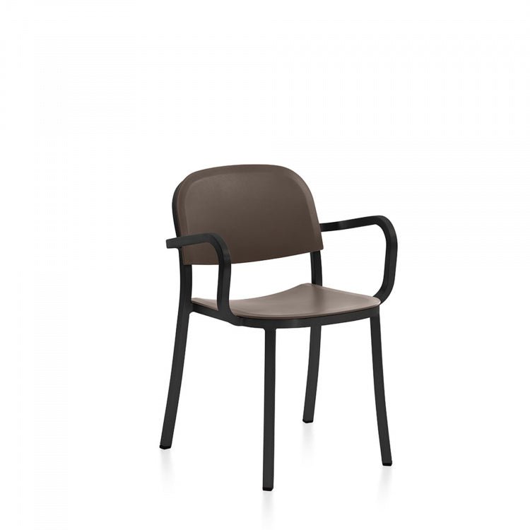Gray upholstered armchair with metal frame and curved arms.