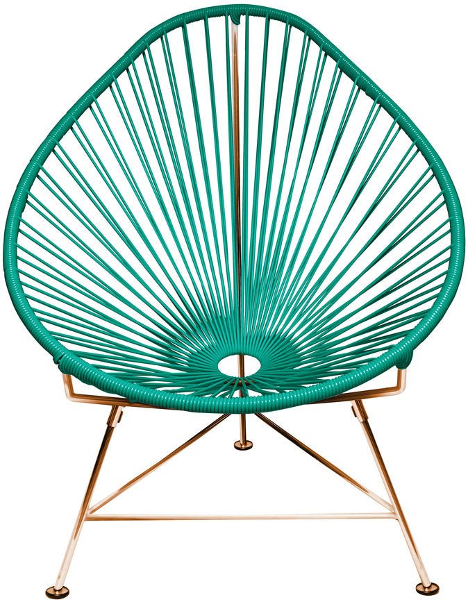 Green circular woven chair with rose-gold metal base, identical design to Acapulco chair