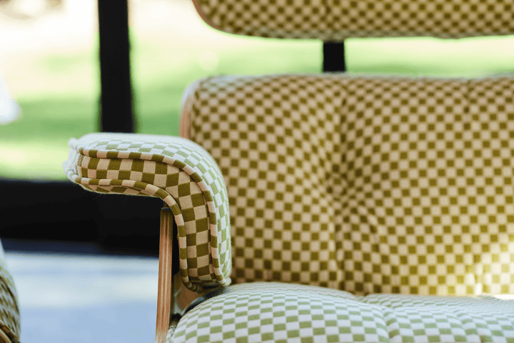 Eames® Lounge Chair and Ottoman - Alexander Girard Check - Herman Miller® - Chairs - Tall - Oiled Walnut - Emerald Light/Ivory Checker - HORNE