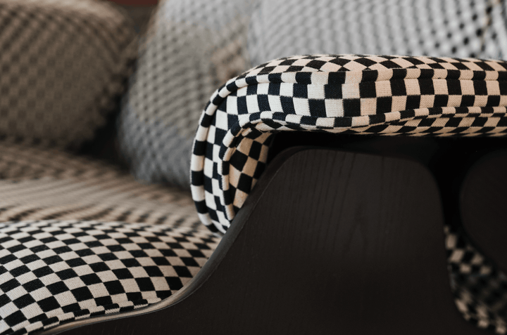 Eames® Lounge Chair and Ottoman - Alexander Girard Check - Herman Miller® - Chairs - Tall - Oiled Walnut - Emerald Light/Ivory Checker - HORNE