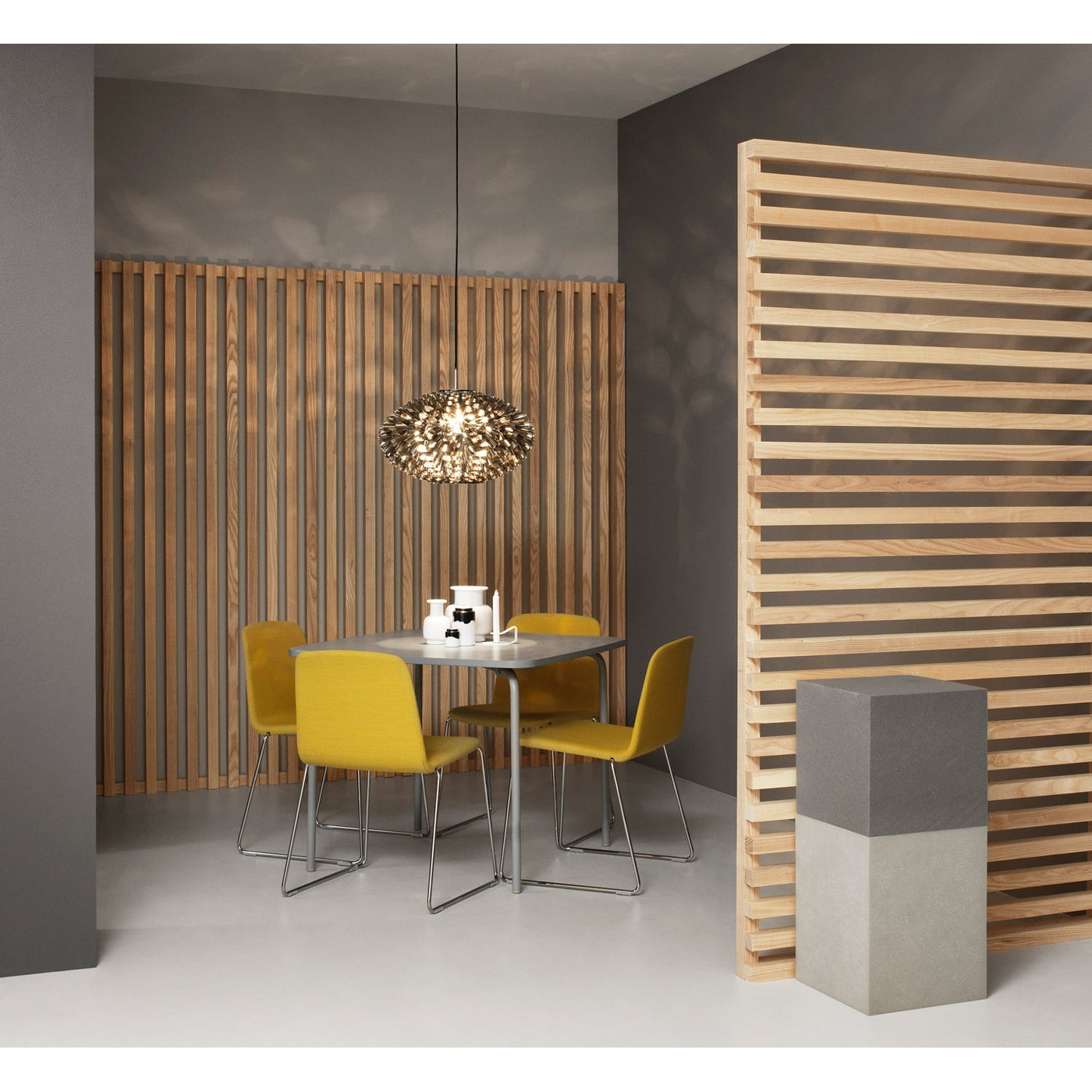 Beige-brown dining chair with cantilever chrome legs, side view showing seat back and seating surface