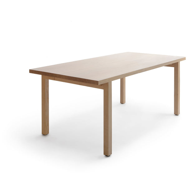 Modern rectangular wood table by Nikari. Perfect for an office conference room