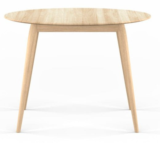 Round wooden table with lighter wood finish and angled legs, product photography