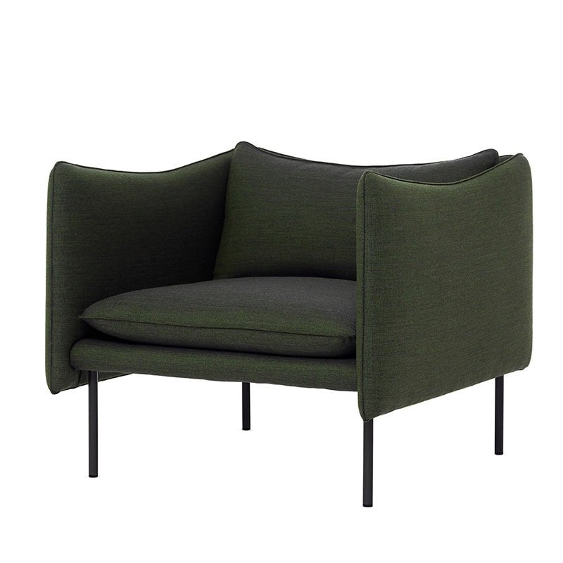 tan leather upholstered armchair with metal legs in white background